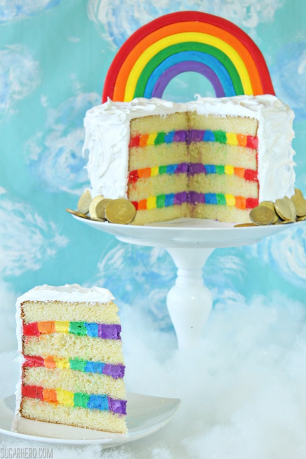 Rainbow in the Clouds Cake - with rainbow buttercream and fluffy cloud frosting | From SugarHero.com