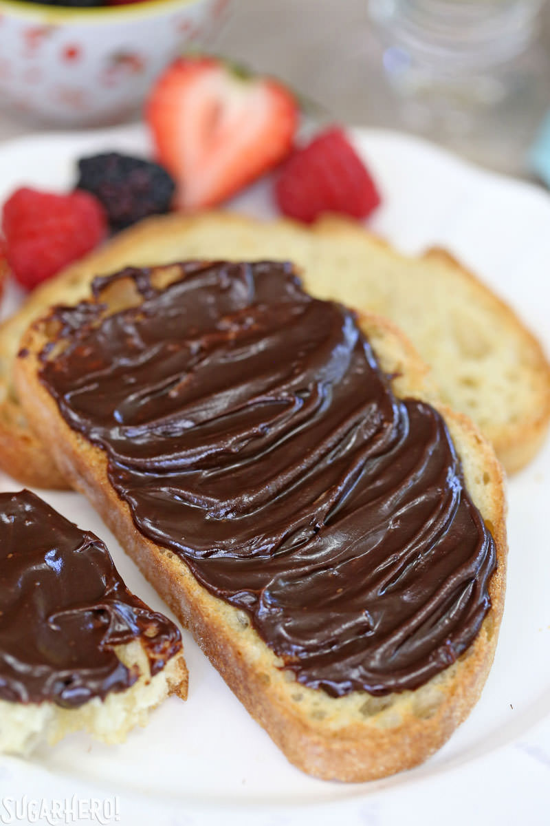 Lick-The-Knife-Clean Chocolate Spread - A shot of toast covered in chocolate spread.| From SugarHero.com