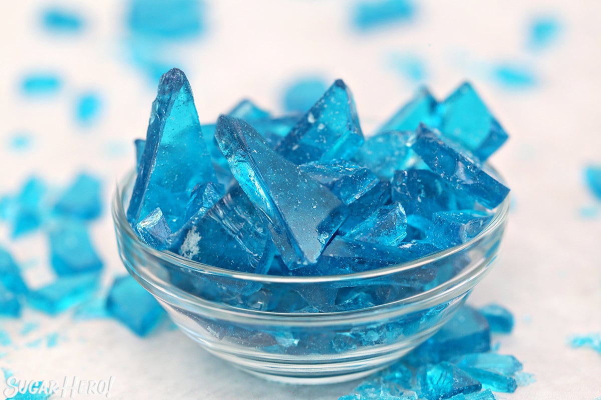 Small glass bowl with shards of blue rock candy.