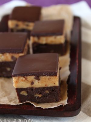Tray of sliced Caramel Cheesecake-Topped Brownies.