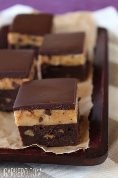 Tray of sliced Caramel Cheesecake-Topped Brownies.