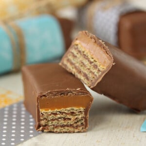 Close up of a Twix Kat Candy Bar cut in half to show the center.