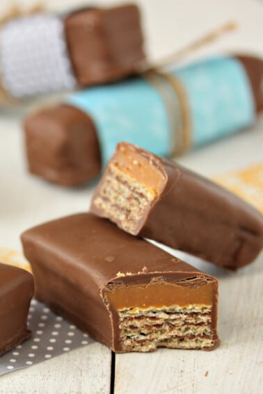 Close up of a Twix Kat Candy Bar that is cut in half to show the center.