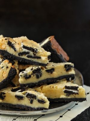 Stack of Cookies and Cream Oreo Cookie Bars on a plate.