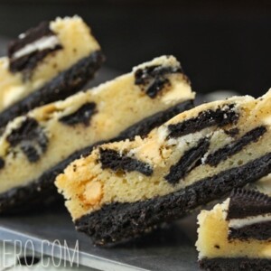 4 Cookies and Cream Oreo Cookie Bars on a black platter.