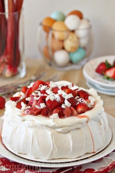 Strawberry Rhubarb Pavlova on a white plate.