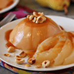 Close up of Caramel Panna Cotta with Poached Pears.