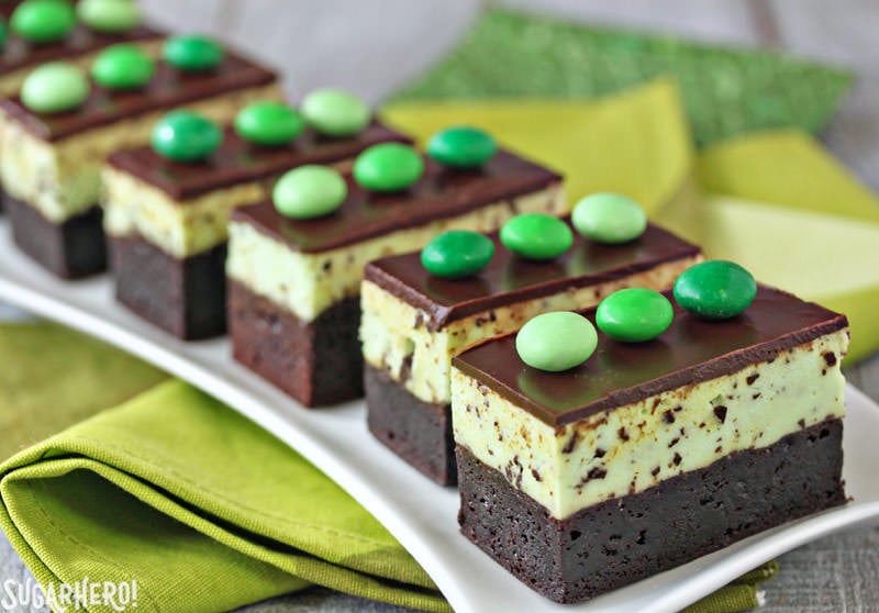 Mint Chocolate Chip Mousse Brownies - fudgy brownies topped with light and fluffy mint chip mousse! | From SugarHero.com