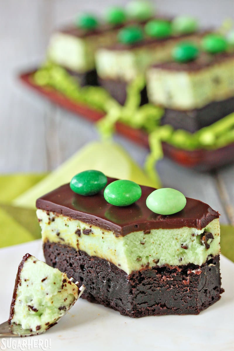 Mint Chocolate Chip Mousse Brownies - fudgy brownies topped with light and fluffy mint chip mousse! | From SugarHero.com