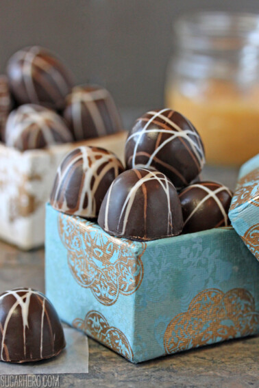 Teal and gold box of Caramelized White Chocolate Truffles.