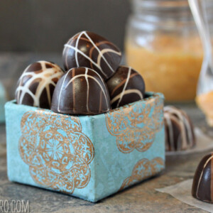 Teal and gold box of Caramelized White Chocolate Truffles.