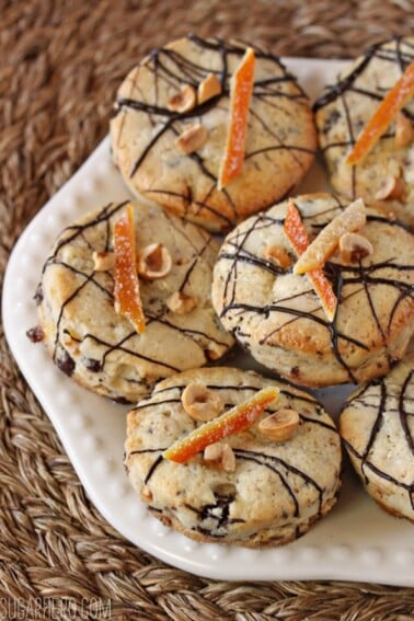 White plate with a pile of Hazelnut Orange Chocolate Scones.