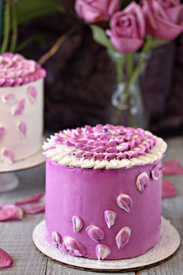 Close up of a Radiant Orchid Mini Cake on a small cake board.
