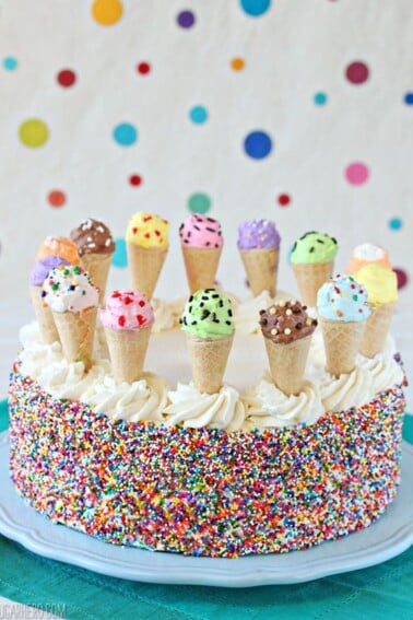 Close up of an Ice Cream Sundae Cake with polka dot background.