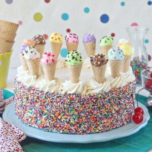 Close up of an Ice Cream Sundae Cake with polka dot background.