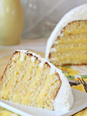 Lemon Coconut Snowball Cake | From SugarHero.com