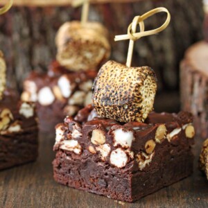 Close up of a Campfire Rocky Road Brownie. on a wooden surface.