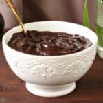 Close up of a bowl of chocolate ganache.