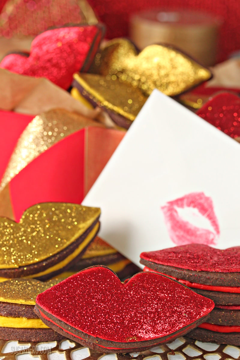 Red Hot Love Cookies - rich chocolate cookies sandwiching a spicy cinnamon buttercream, and finished with gorgeous glittery decorations! | From SugarHero,com