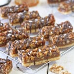 Cut Salted Honey Walnut Bars on a wire rack.