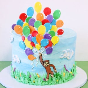 Close up of a Curious George Birthday Cake.