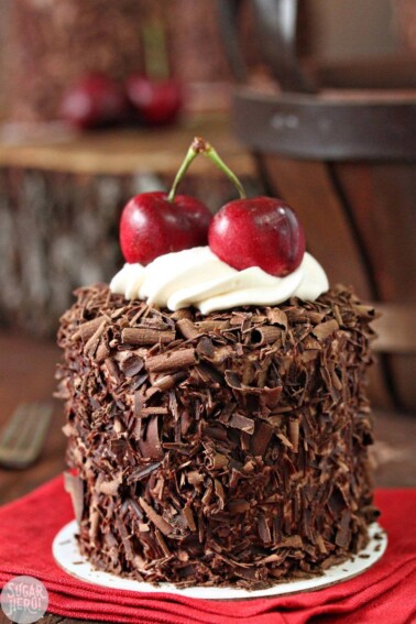 Close up of Black Forest Mini Cake on a red napkin.