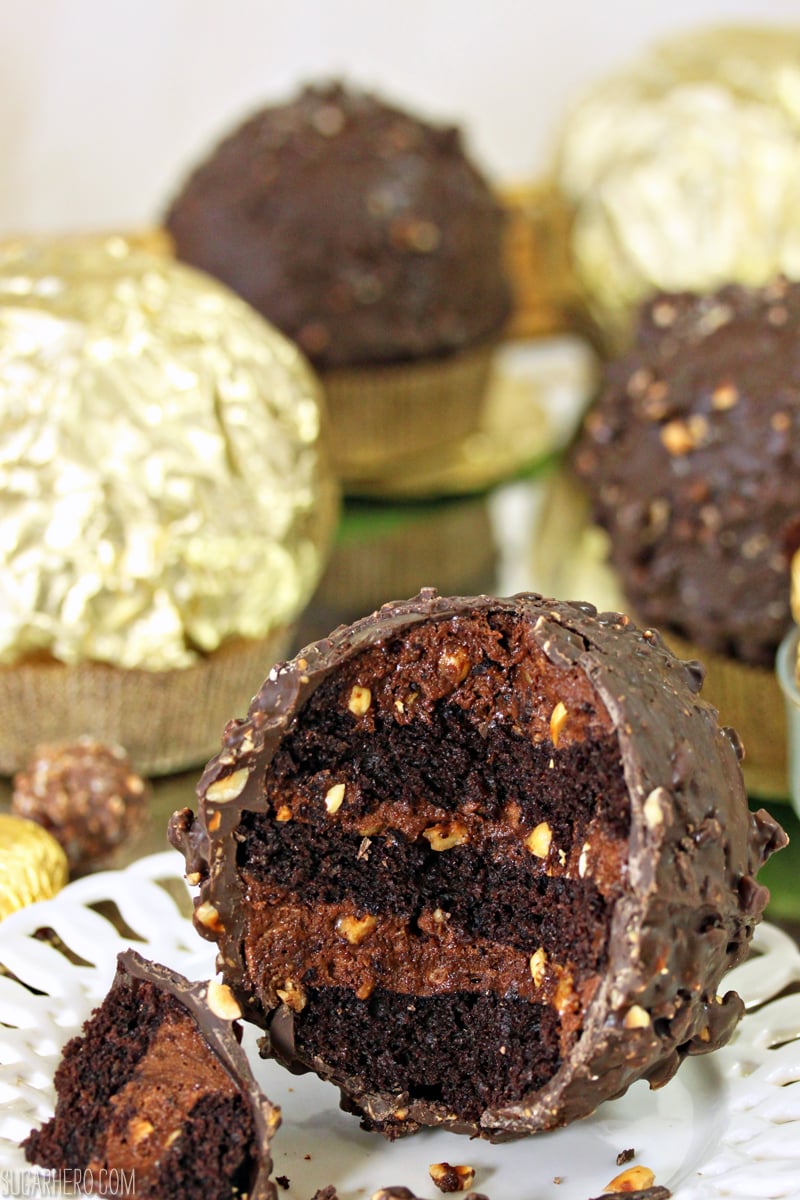 Giant Ferrero Rocher Hazelnut Mousse Cakes | From SugarHero.com Giant Ferrero Rocher Hazelnut Mousse Cakes - full of chocolate cake and hazelnut mousse! | From SugarHero.com