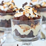 Close up of a toasted coconut chocolate trifle in a small trifle bowl.