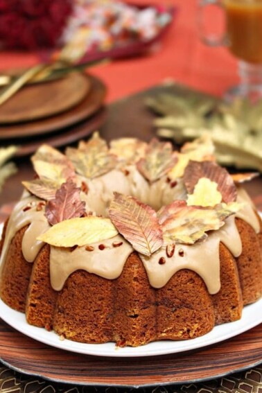 Pumpkin Pound Cake with brown sugar glaze and chocolate leaves on top.