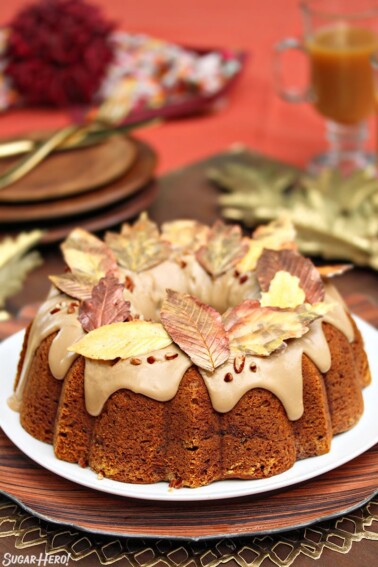 Pumpkin Pound Cake with a thick glaze and chocolate leaves on top.