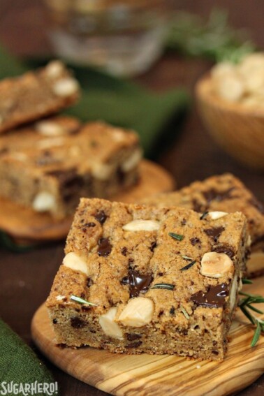 Rosemary Almond Blondies on a wooden cutting board.