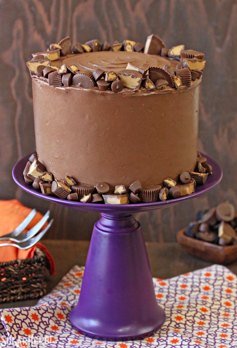 Peanut Butter Cup Banana Cake - Banana cake with layers of chocolate and peanut butter frosting! | From SugarHero.com
