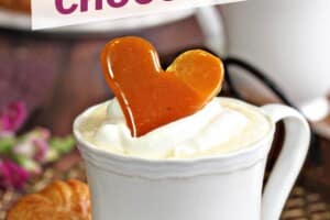 Photo of Crème Brulee White Hot Chocolate with text overlay for Pinterest.