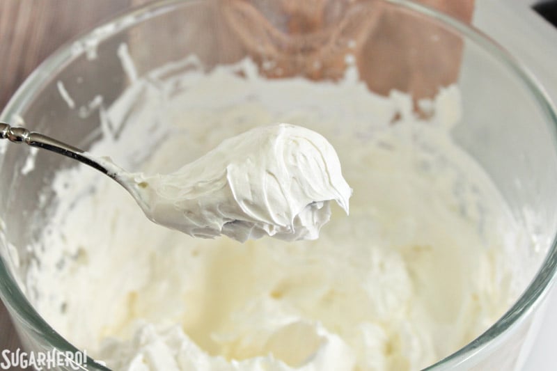 How to Make Swiss Meringue Buttercream - A close up shot of the light and fluffy buttercream. | From SugarHero.com