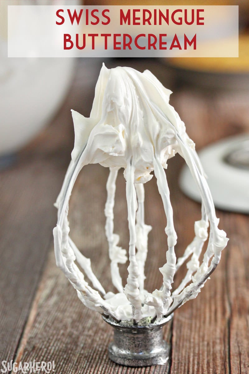 How to Make Swiss Meringue Buttercream - A close up shot of buttercream on the wire whip. | From SugarHero.com