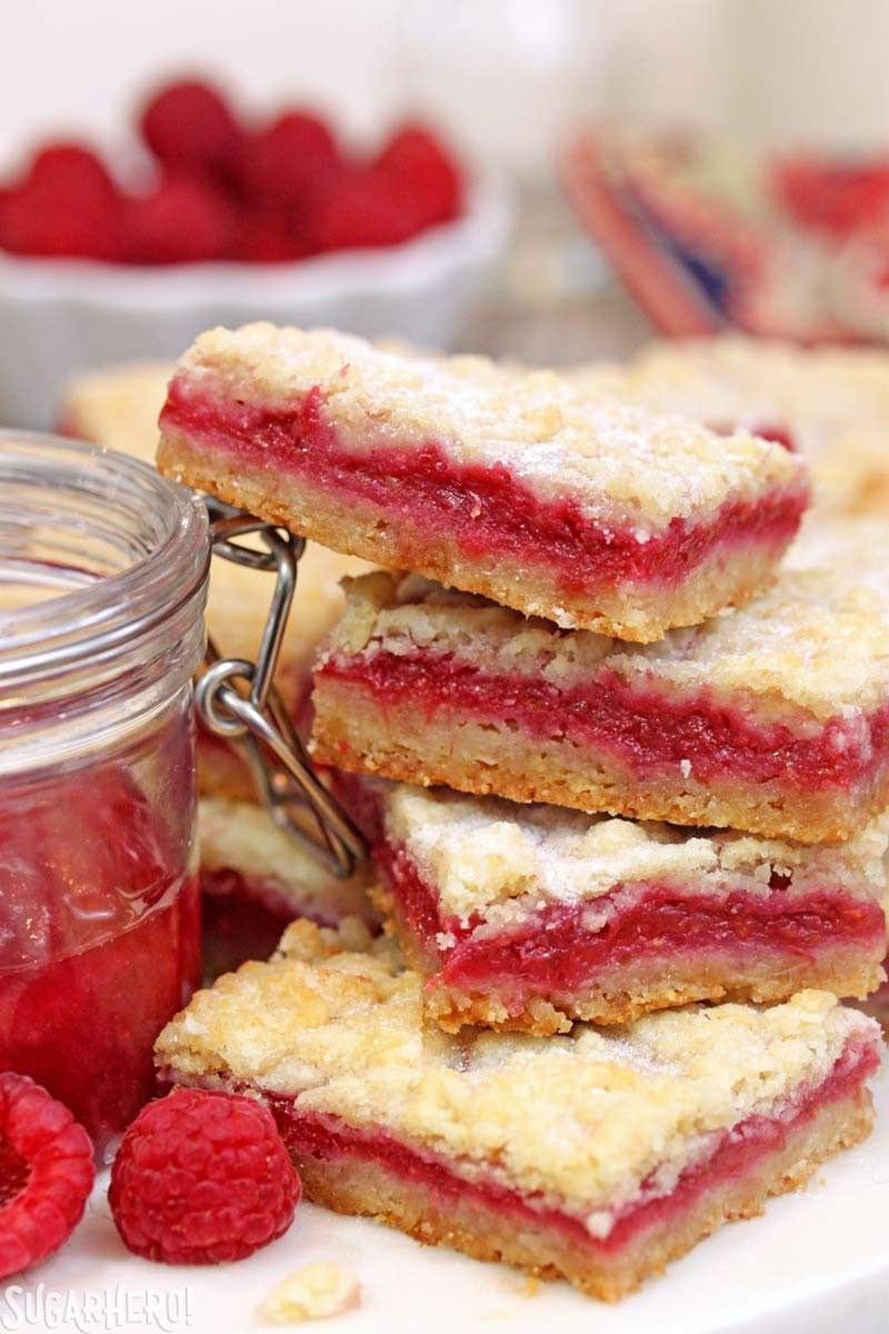 Raspberry Rhubarb Almond Bars - sweet almond bars with a delicously tart raspberry-rhubarb jam inside! | From SugarHero.com Raspberry Rhubarb Almond Bars | From SugarHero.com