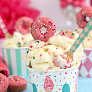Close up of Doughnut Funfetti Ice Cream in a brightly colored cup.