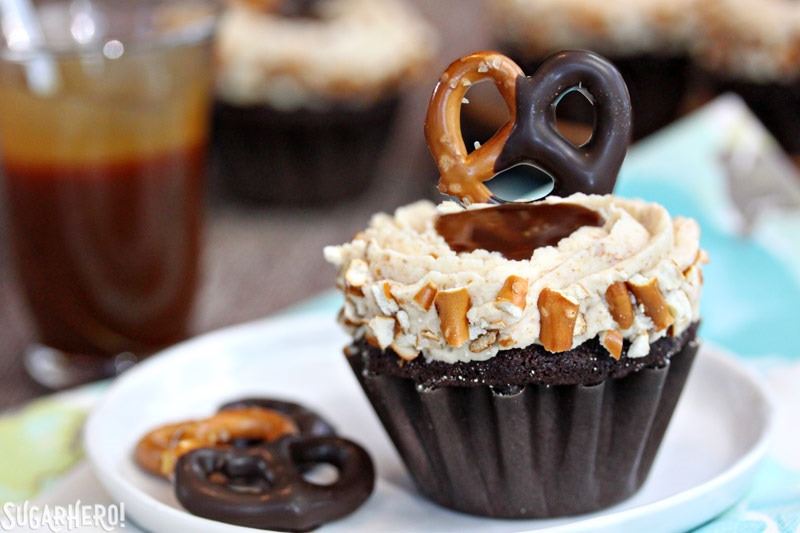 Chocolate-Dipped Pretzel Cupcakes with Pretzel Frosting and Salted Caramel | From SugarHero.com