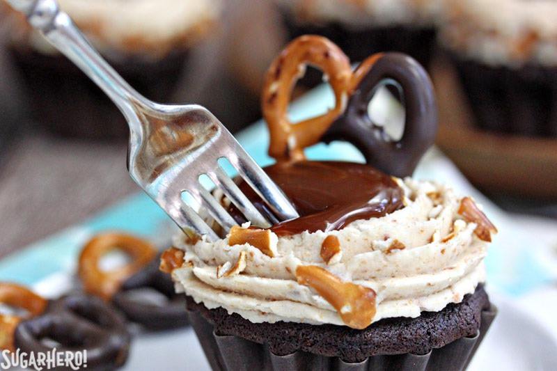 Chocolate-Dipped Pretzel Cupcakes with Pretzel Frosting and Salted Caramel | From SugarHero.com