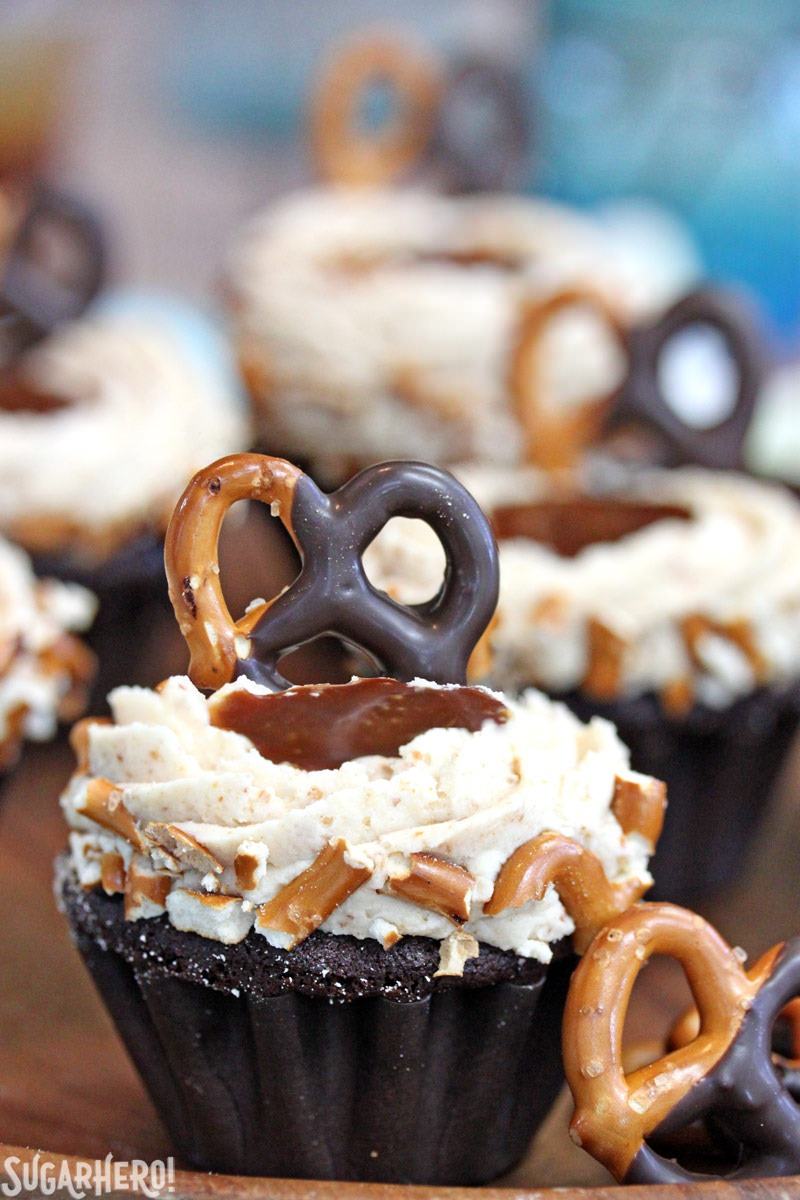 Chocolate-Dipped Pretzel Cupcakes with Pretzel Frosting and Salted Caramel | From SugarHero.com