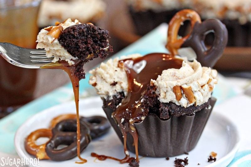 Chocolate-Dipped Pretzel Cupcakes with Pretzel Frosting and Salted Caramel | From SugarHero.com