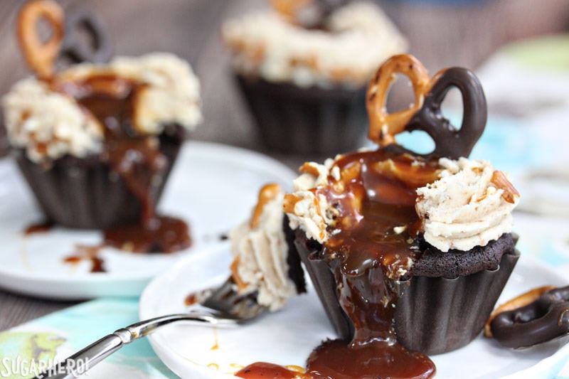 Chocolate-Dipped Pretzel Cupcakes with Pretzel Frosting and Salted Caramel | From SugarHero.com