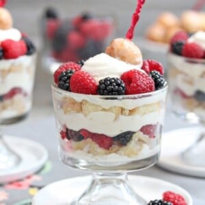 3 Doughnut Trifles on white plates.