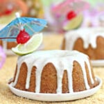 Close up of a Mai Tai Bundt Cake on a small white plate.