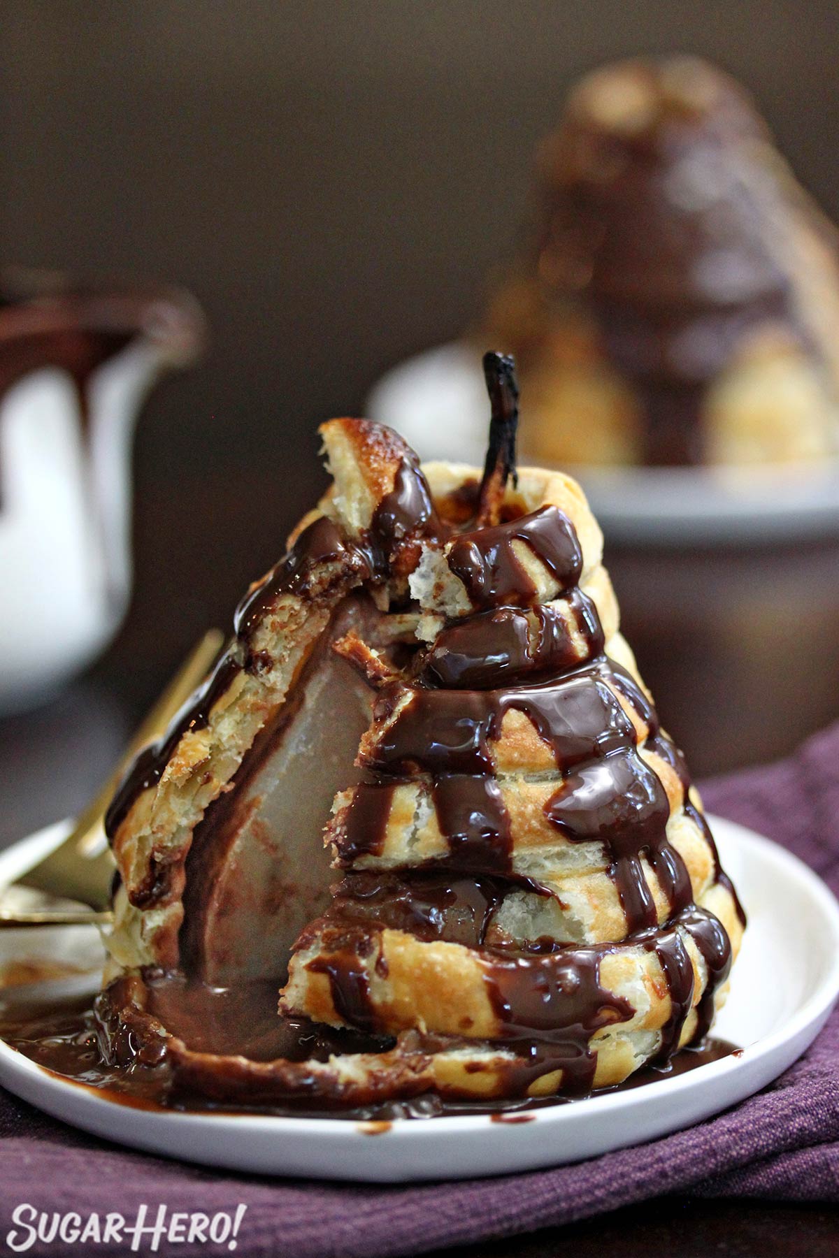 Puff Pastry-Wrapped Pears with Chocolate Espresso Sauce | From SugarHero.com