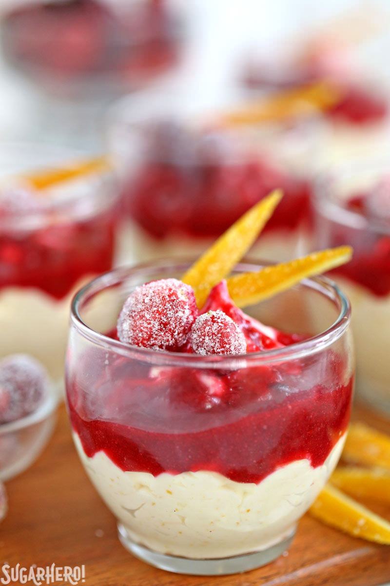 Orange Mousse with Cranberry Sauce - A straight shot of the mousse cups. | From SugarHero.com