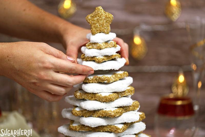 Gingerbread Christmas Cookie Tree - a gorgeous dessert tree made entirely from gingerbread cookies! It's a beautiful and delicious Christmas dessert | From SugarHero.com