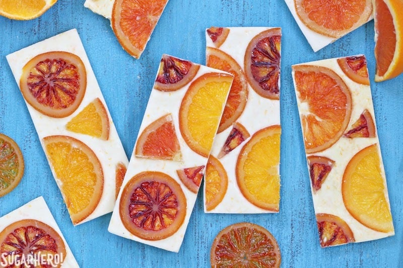 Candied Orange White Chocolate Bars - white chocolate bars with orange zest and candied oranges. Sweet, tart, and tangy! | From SugarHero.com