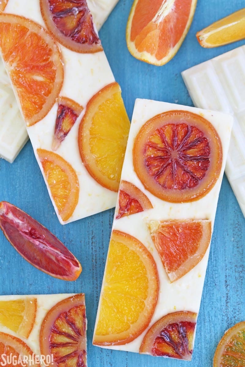 Candied Orange White Chocolate Bars - white chocolate bars with orange zest and candied oranges. Sweet, tart, and tangy! | From SugarHero.com