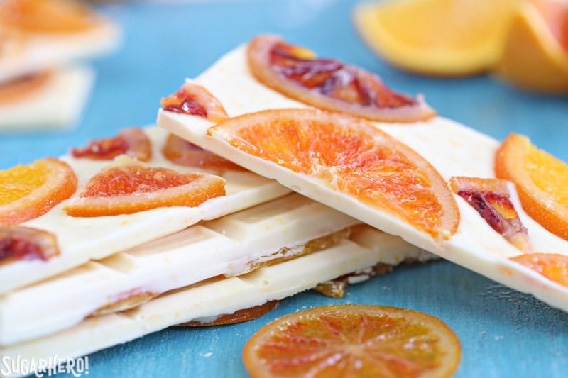 Candied Orange White Chocolate Bars - white chocolate bars with orange zest and candied oranges. Sweet, tart, and tangy! | From SugarHero.com